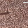Mikroskopaufnahme eines hellroten Sandsteins mit einer Mittelsand-Grobsand-Wechsellagerung und einer Tonschmitze.